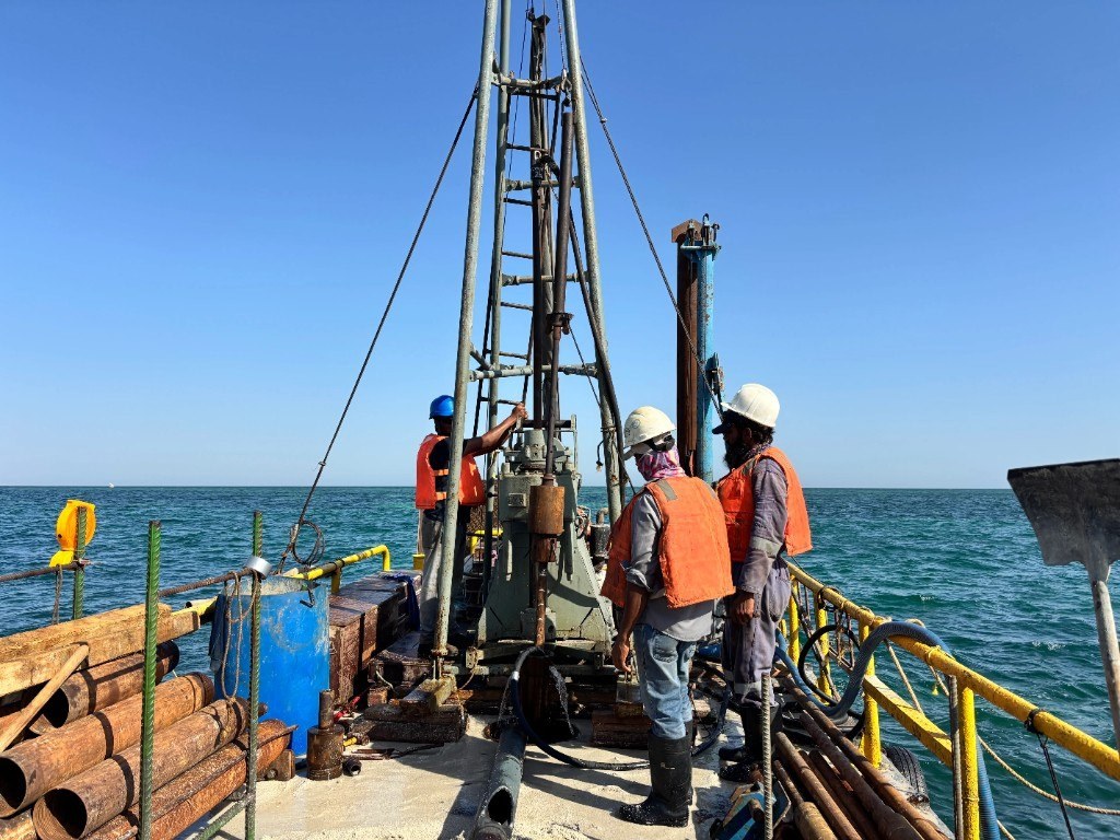 QEL crew performing offshore geotechnical drilling from a marine platform